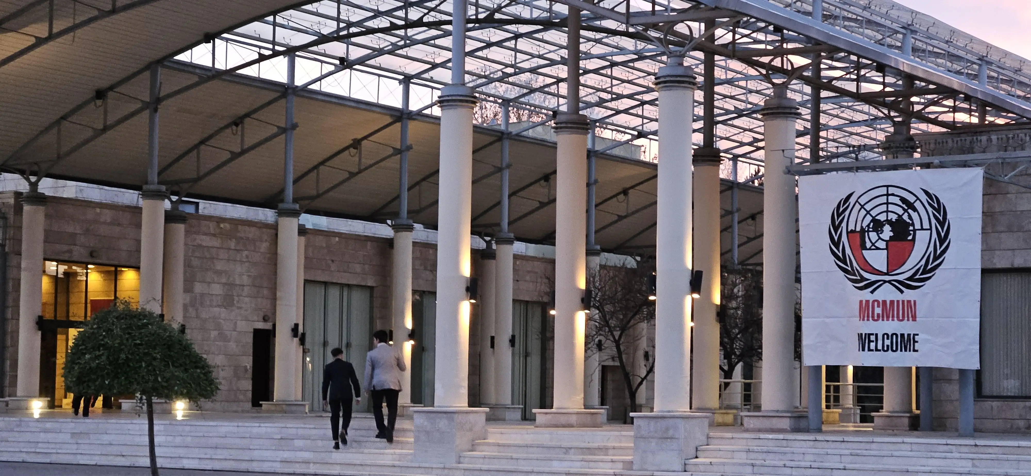 Background image depicting the Kültür Merkezi of ODTÜ Geliştirme Vakfı Okulları (ODTÜ Koleji, Metu) campus for the MCMUN 2025 MUN conference. The photo was taken last year at 4 PM, near the ODTÜ MUN center.